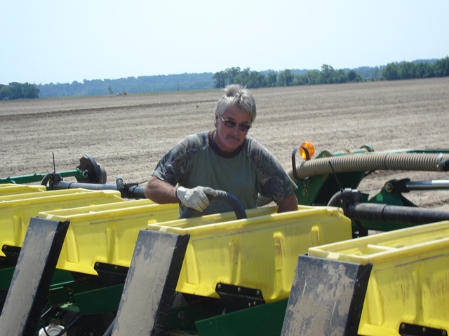 Vacuuming out hoppers. ​