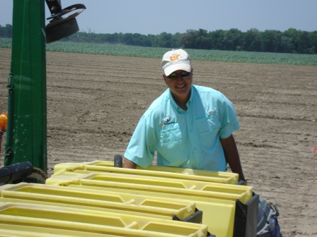 Richard Buntin assisting JC Dupree with soybean plot.